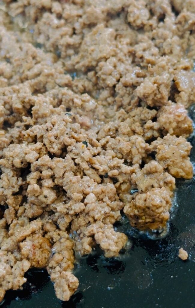 burger meat on the griddle