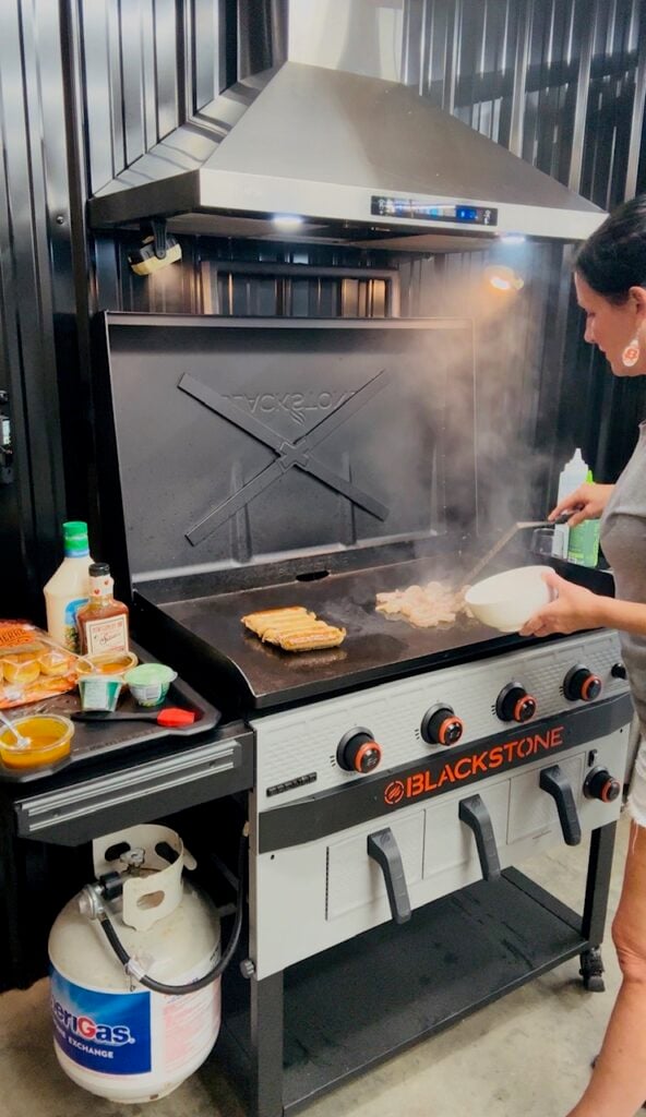 adding shrimp to griddle